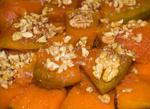 Close up shot of pumpkin desert with walnuts 