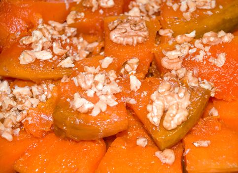 Close up shot of pumpkin desert with walnuts 