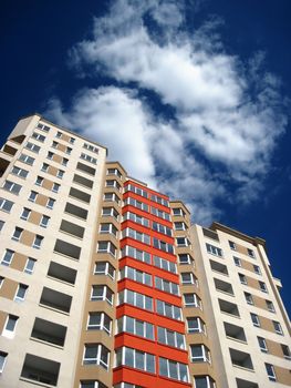 new apartment building over blue sky            