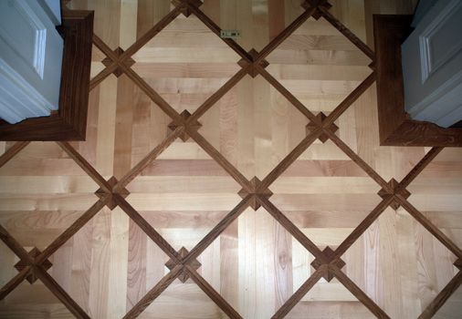 Detail of ornamental wooden pattern parquet floor