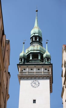 Clock tower of bohemian church in perspective