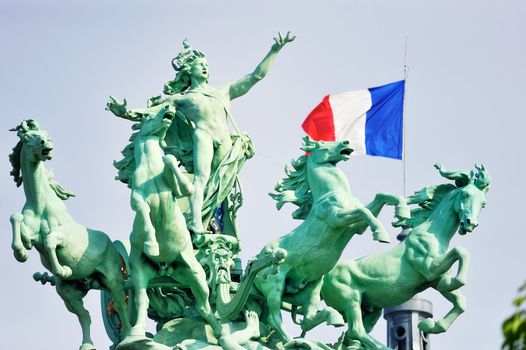 Bronze sculpture of four horses on the Grand Palais in Paris