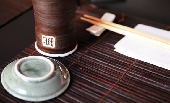Original place setting for asian food with  chopsticks
