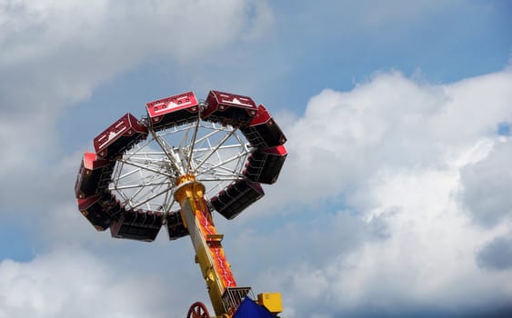 Roundabout on background of the dramatic cloudy sky