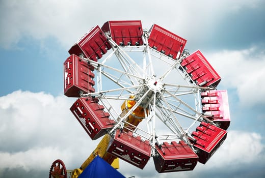 Roundabout on background of the dramatic cloudy sky