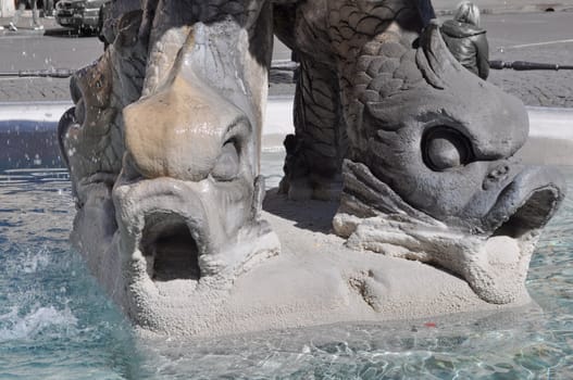 Baroque Triton Fountain (Fontana del Tritone) in Rome, Italy