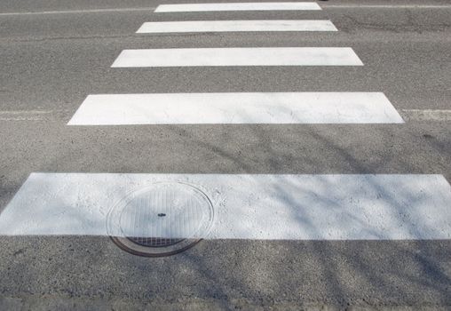 Detail of zebra crossing (pedestrian traffic sign)