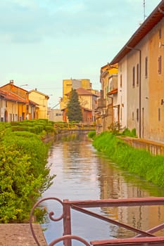 Little canal with houses on the sides
