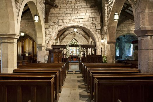 church interior showing centre isle and pews