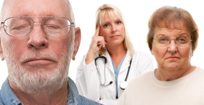 Concerned Senior Couple and Female Doctor Behind with Selective Focus the Gentleman in front.