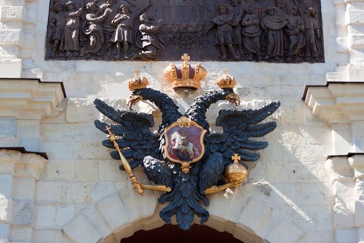Coat of arms of Russian empire above the Petrovsky gates of Peter and Paul fortress
