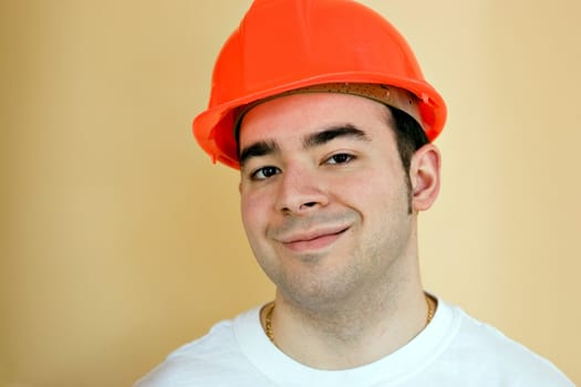 A young construction professional smiling with copy space.