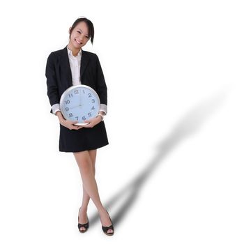 Happy smiling business woman with clock, time concept with full length portrait isolated on white background.