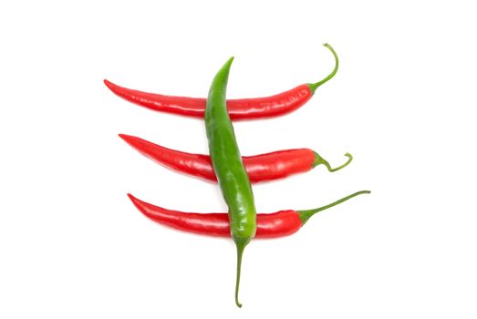 Four chili peppers on a white background