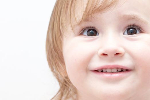 Bright closeup portrait of adorable little girl.