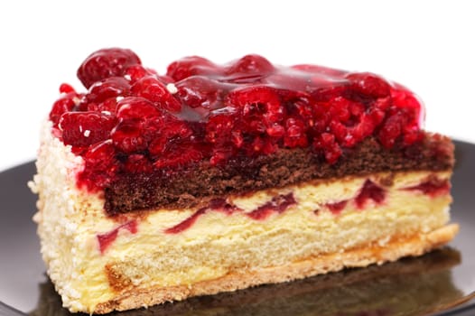 Raspberry cake close-up on a plate