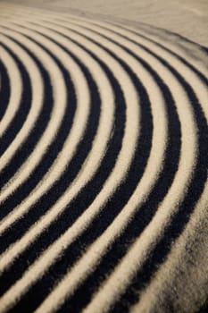 Close up view of the detail of some ripples on sand.