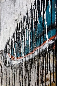 Close up view of a colored and worn texture wooden door.