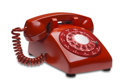 Red angled 60s rotary dial phone isolated with clipping path