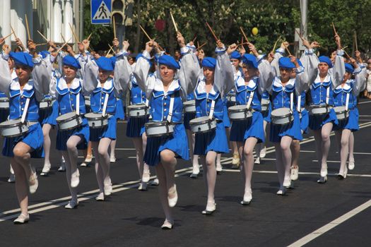 Drummers in the blue form march along the street, town Gomel, Belarus, 9 may 2009