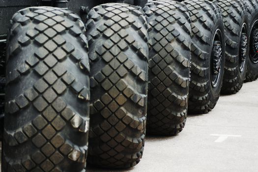 A row of gradually turning wheels on a picture diagonal
