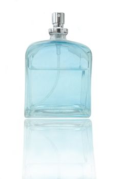 A single glass blue perfume bottle arranged over white and reflecting into the foreground.