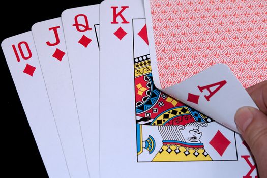 Royal Flush poker hand with one card only seen by player