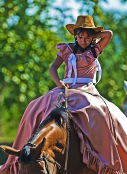 TACUAREMBO, URUGUAY - MAR 6 : Participant in the annual festival "Patria Gaucha" March 6, 2010 in Tacuarembo, Uruguay. It is one of the biggest festival in South America to celebrate gaucho culture