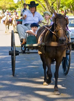 TACUAREMBO, URUGUAY - MAR 6 : Participants in the annual festival "Patria Gaucha" March 6, 2010 in Tacuarembo, Uruguay. It is one of the biggest festival in South America to celebrate gaucho culture