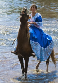 TACUAREMBO, URUGUAY - MAR 6 : Participant in the annual festival "Patria Gaucha" March 6, 2010 in Tacuarembo, Uruguay. It is one of the biggest festival in South America to celebrate gaucho culture