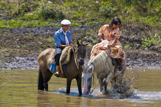 TACUAREMBO, URUGUAY - MAR 6 : Participants in the annual festival "Patria Gaucha" March 6, 2010 in Tacuarembo, Uruguay. It is one of the biggest festival in South America to celebrate gaucho culture