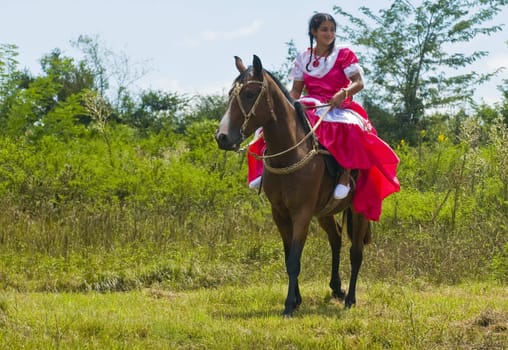 TACUAREMBO, URUGUAY - MAR 6 : Participant in the annual festival "Patria Gaucha" March 6, 2010 in Tacuarembo, Uruguay. It is one of the biggest festival in South America to celebrate gaucho culture