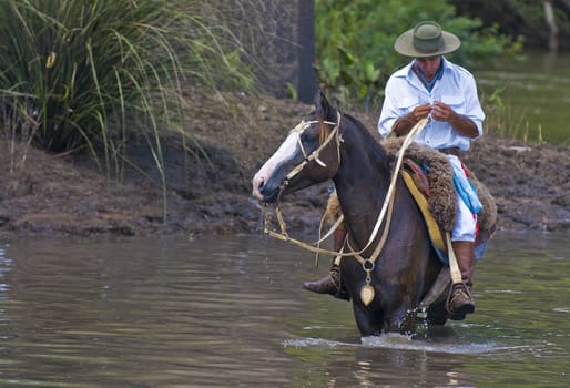 TACUAREMBO, URUGUAY - MAR 6 : Participant in the annual festival "Patria Gaucha" March 6, 2010 in Tacuarembo, Uruguay. It is one of the biggest festival in South America to celebrate gaucho culture