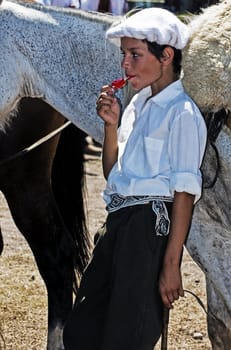 TACUAREMBO, URUGUAY - MAR 6 : Participant in the annual festival "Patria Gaucha" March 6, 2010 in Tacuarembo, Uruguay. It is one of the biggest festival in South America to celebrate gaucho culture