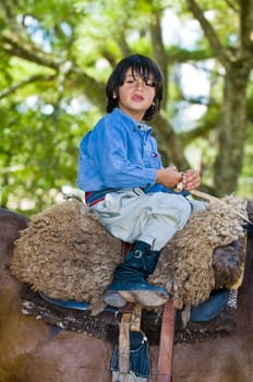 TACUAREMBO, URUGUAY - MAR 6 : Participant in the annual festival "Patria Gaucha" March 6, 2010 in Tacuarembo, Uruguay. It is one of the biggest festival in South America to celebrate gaucho culture