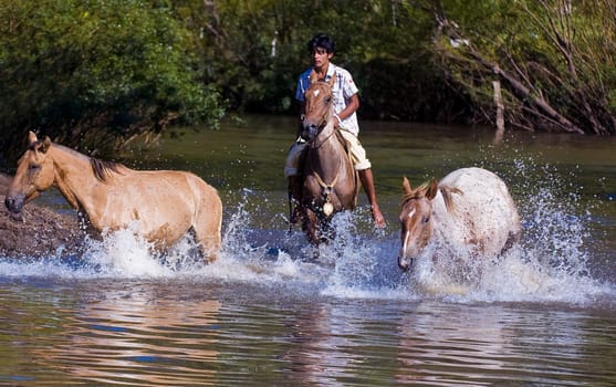 TACUAREMBO, URUGUAY - MAR 6 : Participant in the annual festival "Patria Gaucha" March 6, 2010 in Tacuarembo, Uruguay. It is one of the biggest festival in South America to celebrate gaucho culture