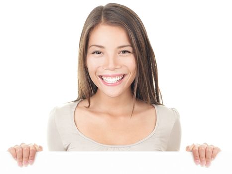 Billboard sign woman. Businesswoman standing behind blank white billboard. Young Asian / Caucasian female model isolated on white background.