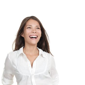 Smiling laughing woman portrait - looking at copy space. Beautiful young mixed Chinese Asian / Caucasian woman close-up.