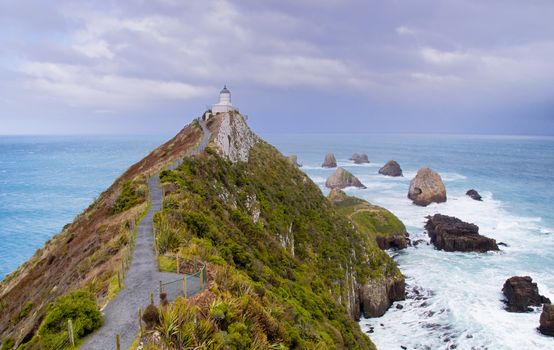 Lighthouse at Nugget Point in New Zealand. 