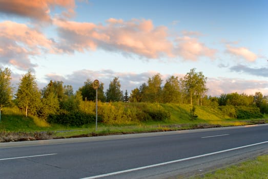 Country road in the early summer morning