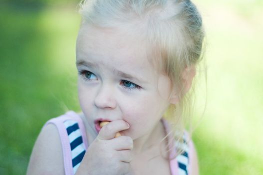 Shot of little cute girl, outside, sunny day