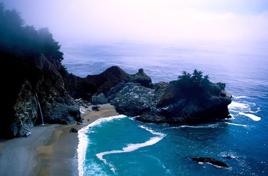 Big Sur is a sparsely populated region of the central California, United States coast where the Santa Lucia Mountains rise abruptly from the Pacific Ocean. The terrain offers stunning views, making Big Sur a popular tourist destination.