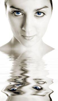 Portrait of a  beautiful woman with blue eyes and reflection