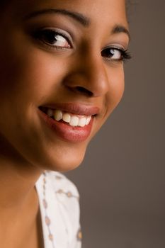 African girl in the studio with a smiling face