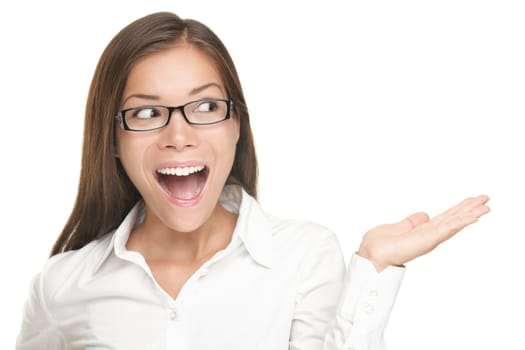 Young woman showing product with open hand palm - excited expression on businesswoman wearing glasses, Isolated on white background. 