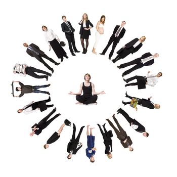 Circle of real people with a man meditating in the middle