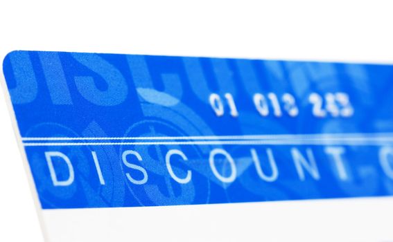 Macro view of plastic discount card. Narrow focus.