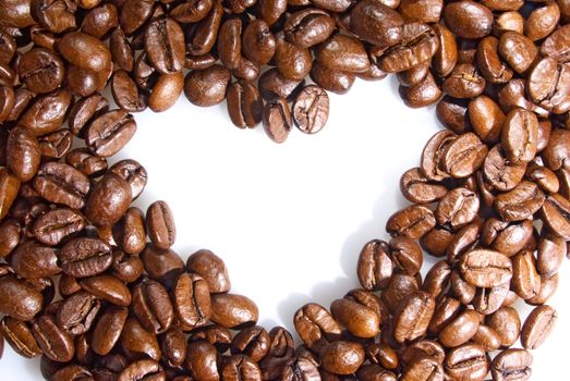 Background heart of coffee grains 