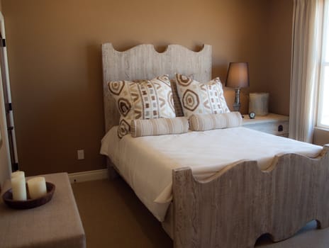 Rustic bedroom with brown walls and wooden bed frame