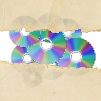 vintage torn paper with cd discs over white